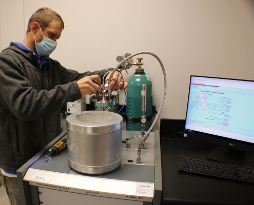 Dan assembling a Delta P Model 410 Getter Sorption Analyzer